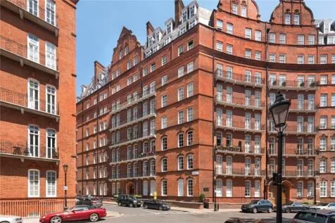 Red-brick mansion block of apartments held as a buy-to-let portfolio investment